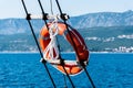 Orange lifeline ring on a boat