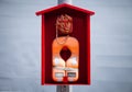 Orange lifevest lifebelt in a red cabin