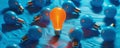 Orange light bulb standing out among blue light bulbs, individuality concept Royalty Free Stock Photo