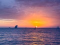 Stormy Sunset Sailboats