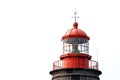 Orange lighthouse over white