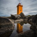 Orange lighthouse at the westcoast of Iceland