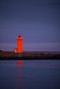 Orange lighthouse at the westcoast of Iceland