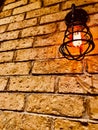 Orange ligth on a classic brick wall Royalty Free Stock Photo