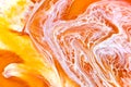 Orange liquid and white foam mixing raster background. Color fluid drops and splashes illustration. Golden bright