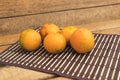 Orange lulos on a wooden table Royalty Free Stock Photo