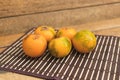 Orange lulos on a wooden table Royalty Free Stock Photo