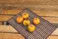 Orange lulos on a wooden table Royalty Free Stock Photo