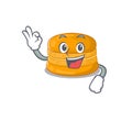 Orange macaron cartoon character design style making an Okay gesture