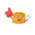 Orange macaron mascot cartoon style with Foam finger