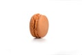 Orange macaroon on white