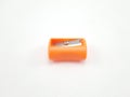 Orange manual hand operated pencil sharpener