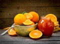 Orange marmlade, orange jam in jar on rustic table