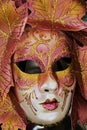 Orange mask and golden decorations, Venice, Italy Royalty Free Stock Photo