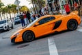 Orange Mclaren supercar on the streets of Fort Lauderdale FL