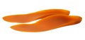 Orange medical insoles isolated on a white background with clipping path.