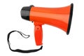 Orange megaphone on white background isolated close up, hand loudspeaker design, loud-hailer or speaking trumpet Royalty Free Stock Photo