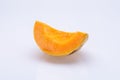 Orange melon slice isolated in front of a white background Royalty Free Stock Photo