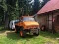 Orange Mercedes-benz Unimog 406 truck at Klinovec, Czech Republic used for mountain rescue service