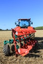 Kubota M7-173 ploughing on stubble in crop field Royalty Free Stock Photo