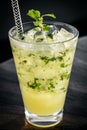 Orange mojito summer cocktail drink in outdoor riverside bar Royalty Free Stock Photo