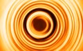 Orange motion blur teleport swirl background Royalty Free Stock Photo