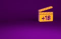 Orange Movie clapper with 18 plus content icon on purple background. Age restriction symbol. Adult channel