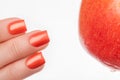 Orange nail polish.