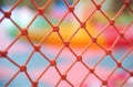Orange nylon net on colorful background playground : Closeup