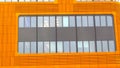 Orange office building facade with rectangular window. Abstract background. Convention center. Urban real estate. Modern architect Royalty Free Stock Photo