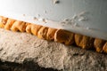 Orange old polyurethane foam between wall and plastic window close-up