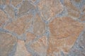 Orange old stone road surface. Seamless Texture. The texture of a stone road Royalty Free Stock Photo