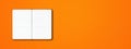 Orange open lined notebook isolated on colorful background. Horizontal banner Royalty Free Stock Photo