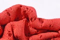 Orange openwork knitted closeup