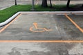 Parking car of disabled, Orange outline of human with wheel chair on the floor. Royalty Free Stock Photo