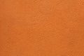 Orange painted stucco wall. Background texture Royalty Free Stock Photo