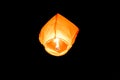 Orange paper sky flaming lantern, flying lantern, floating lantern Royalty Free Stock Photo