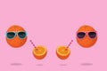 Orange party of fresh fruit, hipster in sunglasses with fresh orange juice, stylish fruit