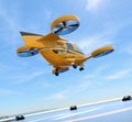 Orange Passenger Drone Taxi takeoff from helipad Royalty Free Stock Photo