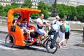 Orange Pedicab in Paris