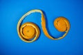 Orange peel on a blue background Royalty Free Stock Photo