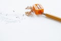 Orange pencil with orange pencil sharpener and shavings Royalty Free Stock Photo