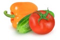 Orange pepper, tomato and cucumber on an isolated white background. Royalty Free Stock Photo
