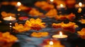 Orange Petals and Candles Floating in Dark Water Royalty Free Stock Photo