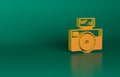 Orange Photo camera with lighting flash icon isolated on green background. Foto camera. Digital photography. Minimalism Royalty Free Stock Photo