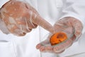 orange piece is examined in the food laboratory