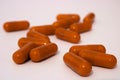 Orange pills on a white background Royalty Free Stock Photo