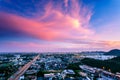 Orange and pink cumulus clouds in sunset with blue sky over the city, sky burst, Chonburi Thailand Royalty Free Stock Photo