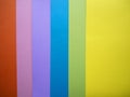 Orange, pink, purple, blue, green and yellow cardboard paper sheets Royalty Free Stock Photo
