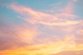 Orange,pink sunset ,blue sky backdorp. Beautiful natural of blue sky with clouds abstract or background. Soft image Royalty Free Stock Photo